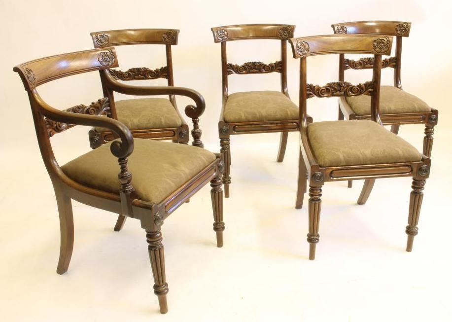 A SET OF FIVE EARLY VICTORIAN MAHOGANY DINING CHAIRS including an elbow chair Image