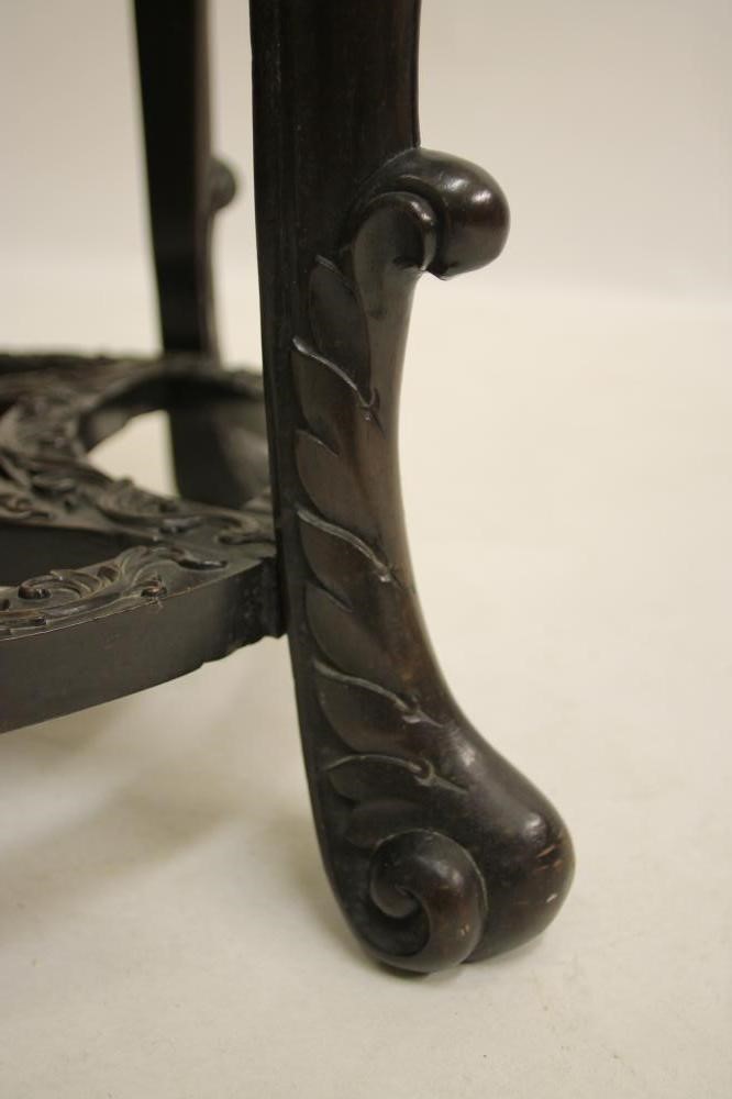 A CHINESE CARVED PADOUK WOOD JARDINIERE STAND Image