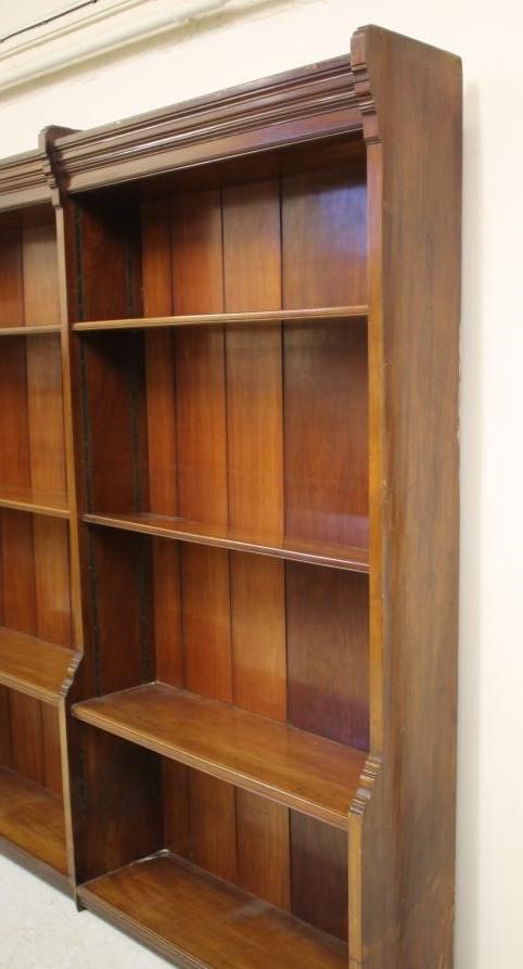 A SET OF VICTORIAN MAHOGANY OPEN BOOKSHELVES in three parts with boarded backing and adjustable Image