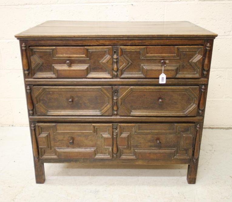 A GEOMETRICALLY MOULDED CHEST Image