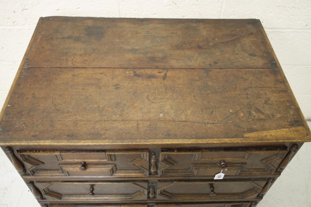 A GEOMETRICALLY MOULDED CHEST Image