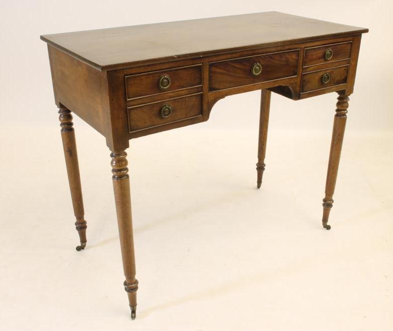A MAHOGANY DRESSING TABLE Image