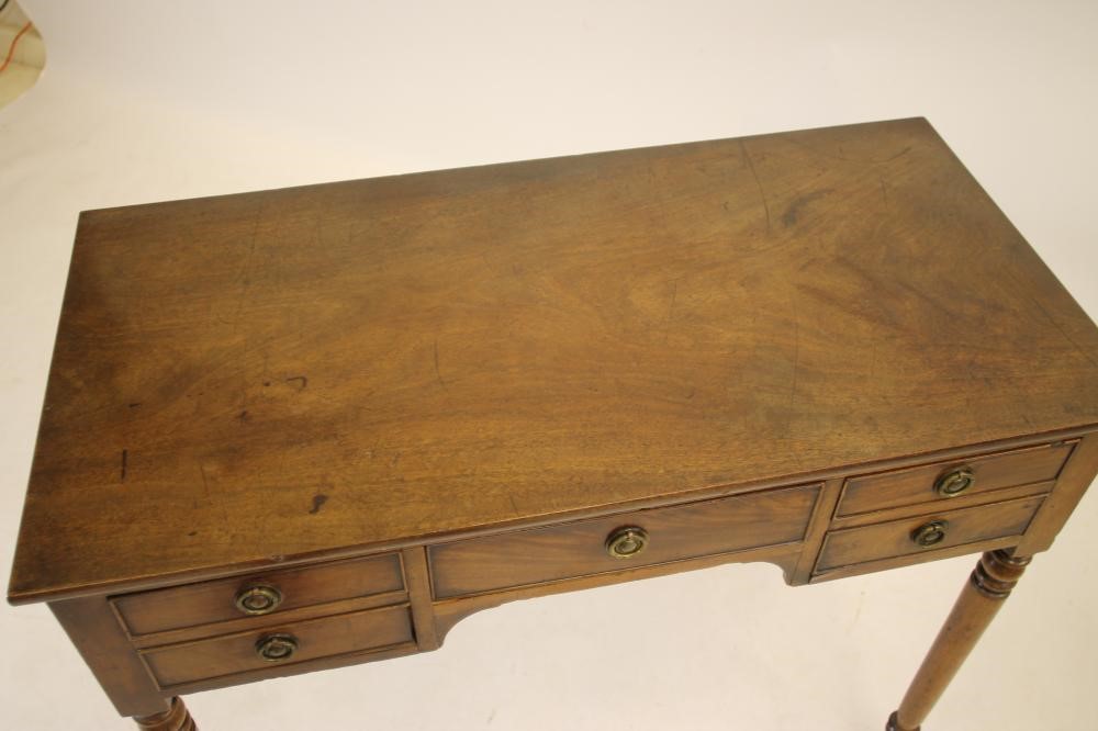 A MAHOGANY DRESSING TABLE Image