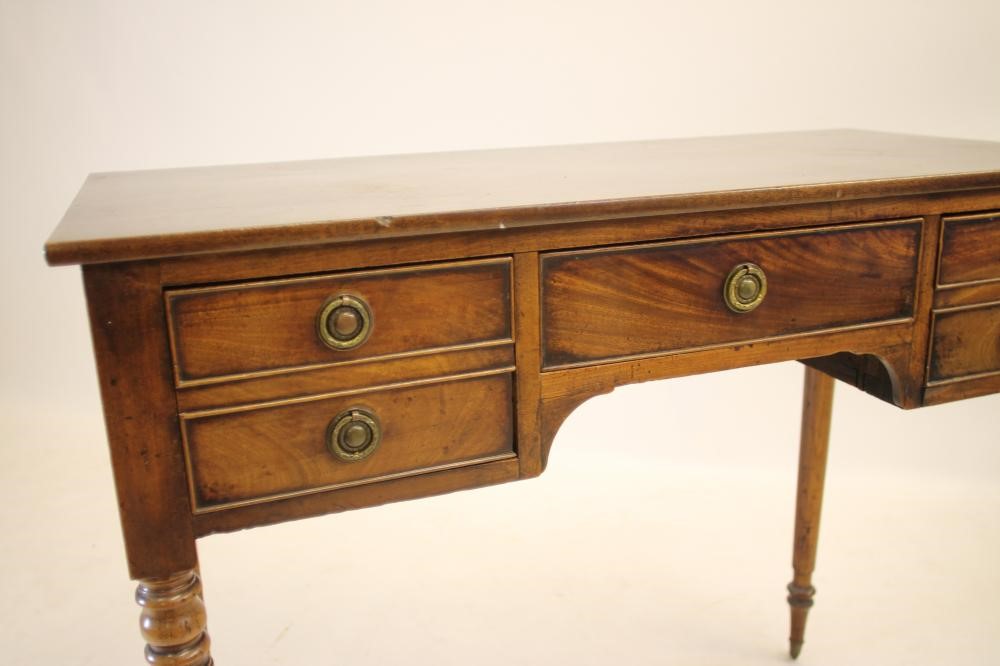 A MAHOGANY DRESSING TABLE Image