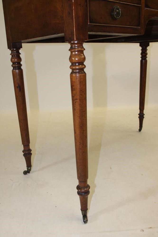 A MAHOGANY DRESSING TABLE Image