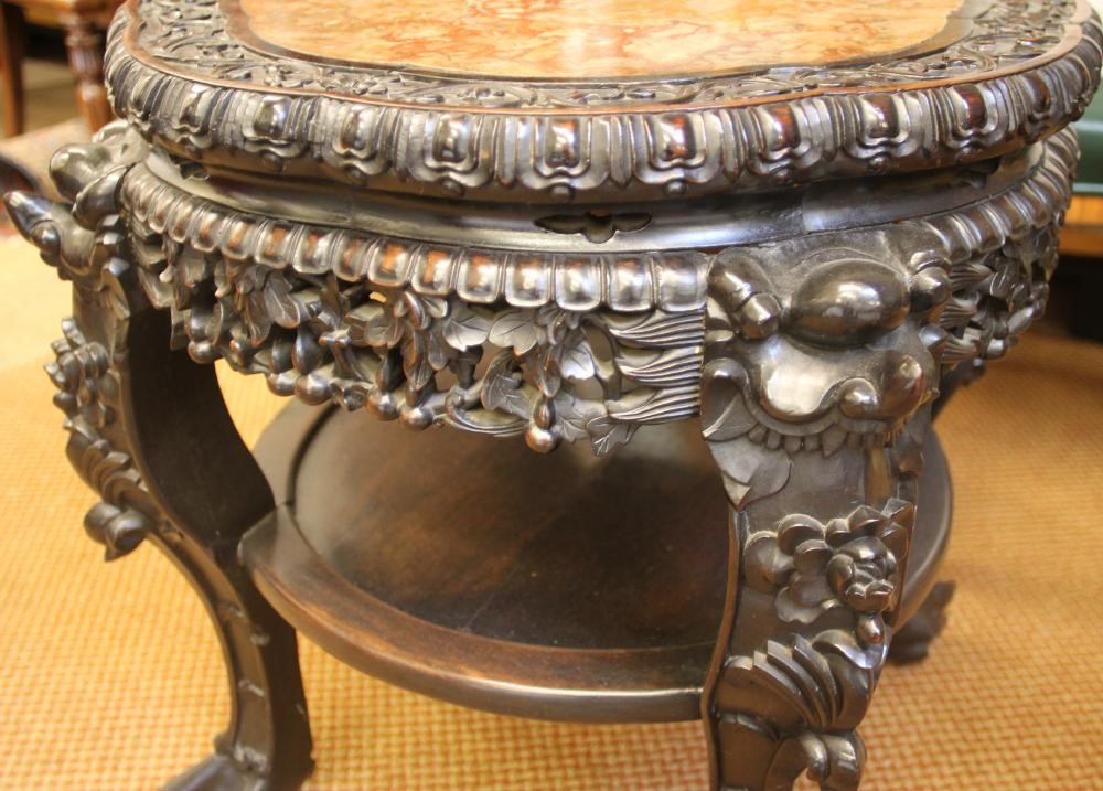 A CHINESE CARVED PADOUK WOOD PLANT STAND Image