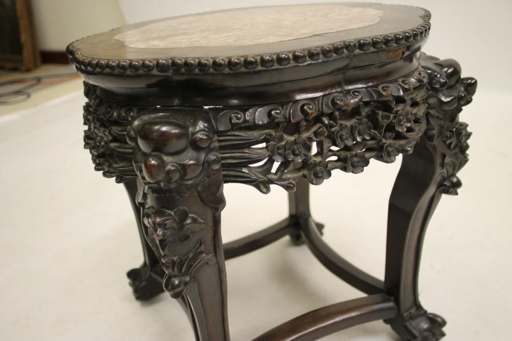 A CHINESE CARVED PADOUK WOOD PLANT STAND Image