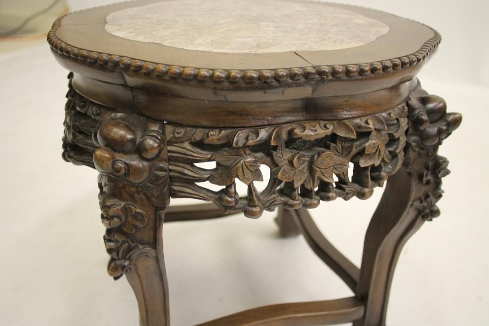 A CHINESE CARVED PADOUK WOOD PLANT STAND Image