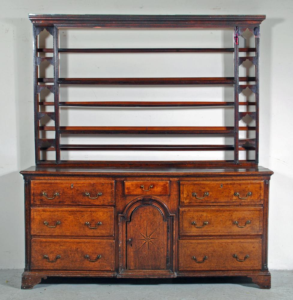 A GEORGIAN OAK ENCLOSED DRESSER Image
