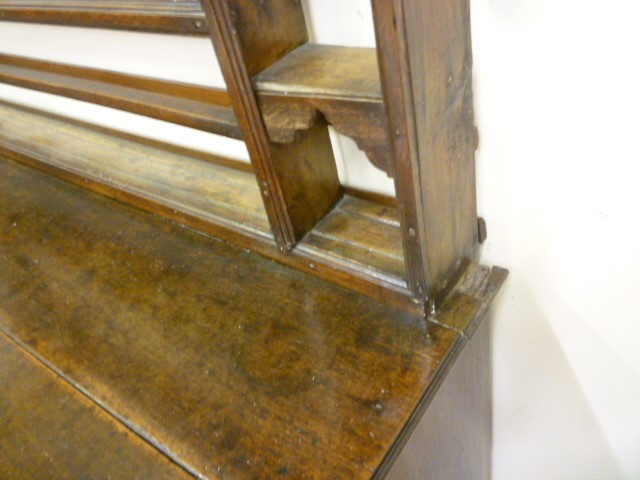 A GEORGIAN OAK ENCLOSED DRESSER Image