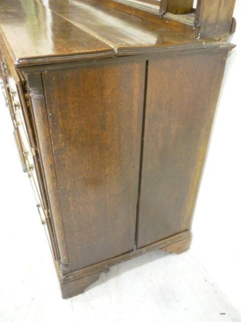 A GEORGIAN OAK ENCLOSED DRESSER Image