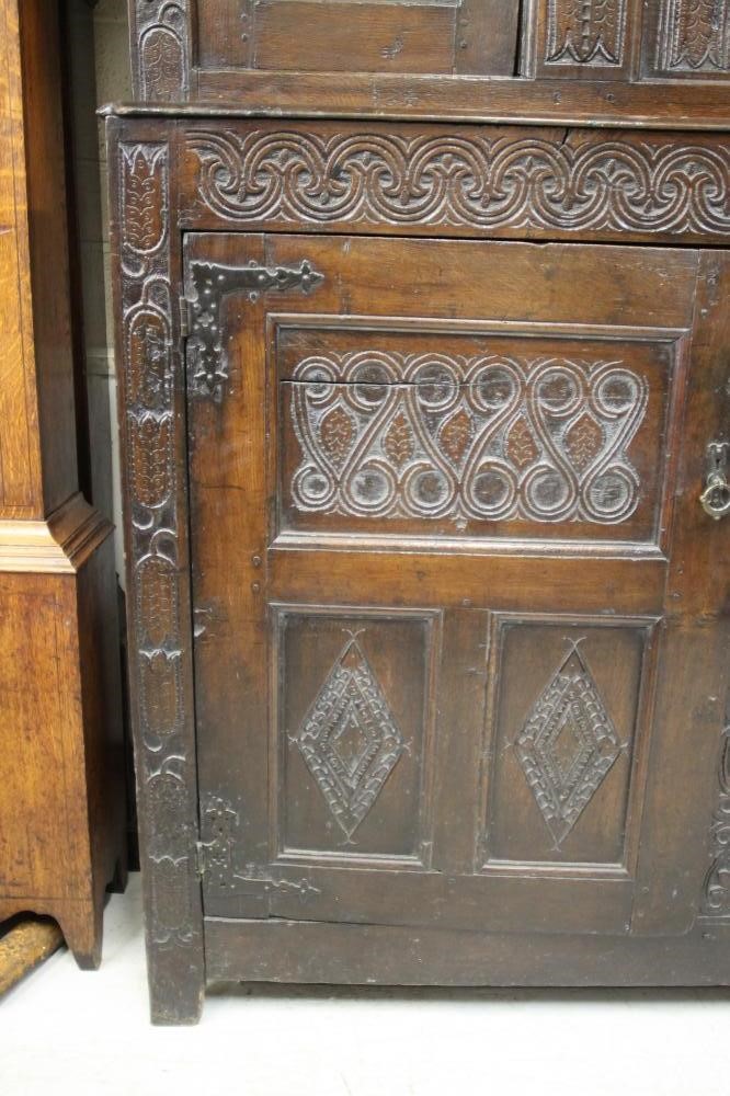 A FINE OAK PRESS CUPBOARD Image
