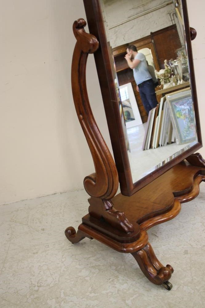 A VICTORIAN MAHOGANY CHEVAL MIRROR Image