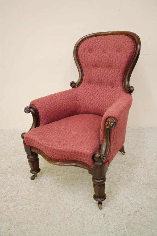 A VICTORIAN WALNUT FRAMED ARMCHAIR of spoonback form Image