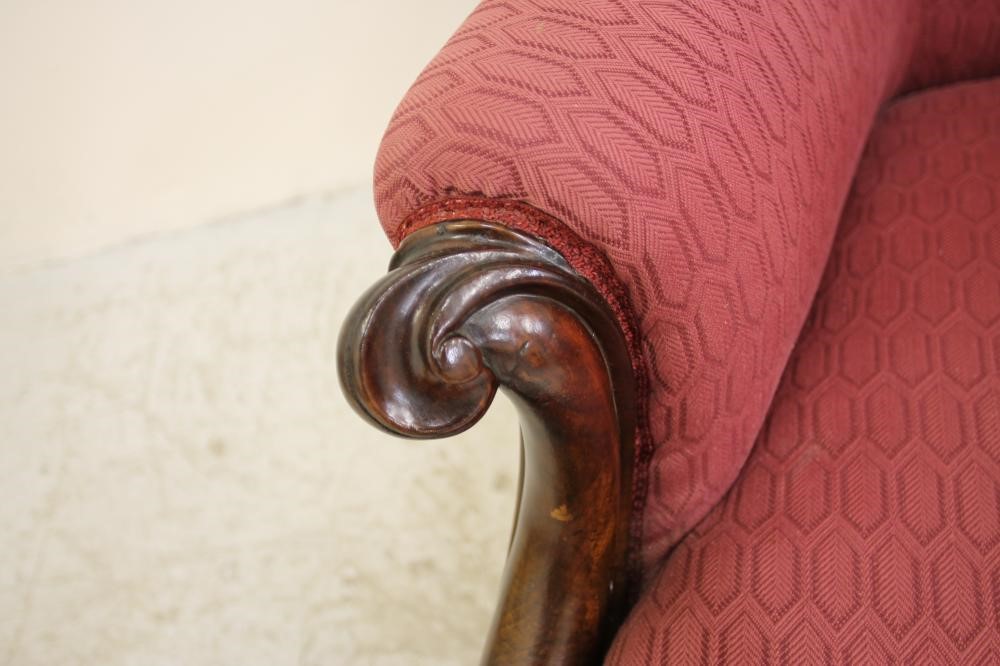 A VICTORIAN WALNUT FRAMED ARMCHAIR of spoonback form Image