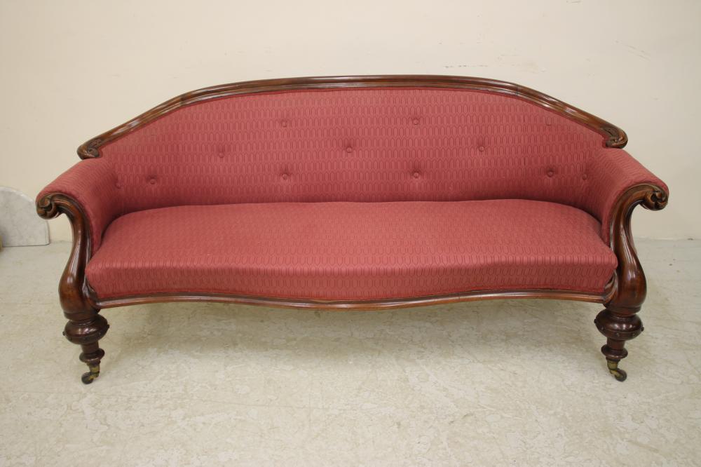 A VICTORIAN WALNUT FRAMED SOFA Image