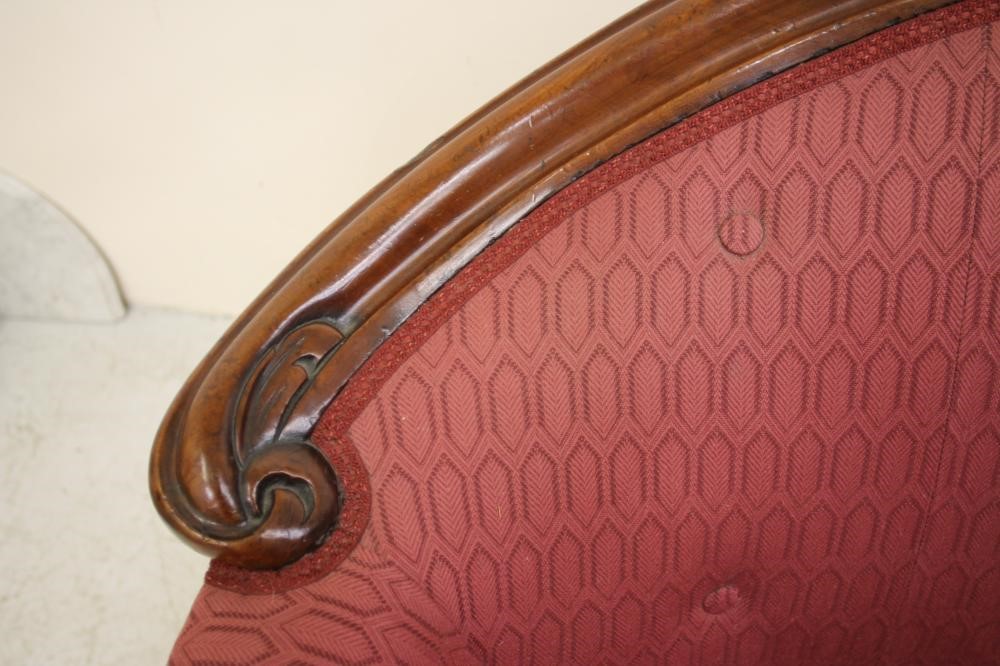 A VICTORIAN WALNUT FRAMED SOFA Image
