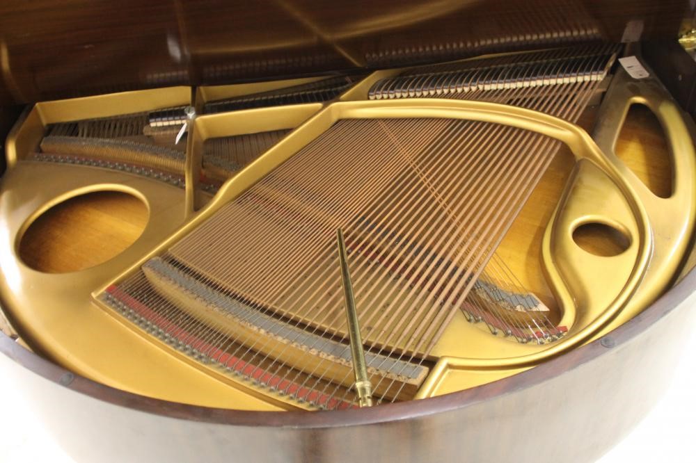 A MAHOGANY FRAMED BABY GRAND PIANO by Strohmenger Image