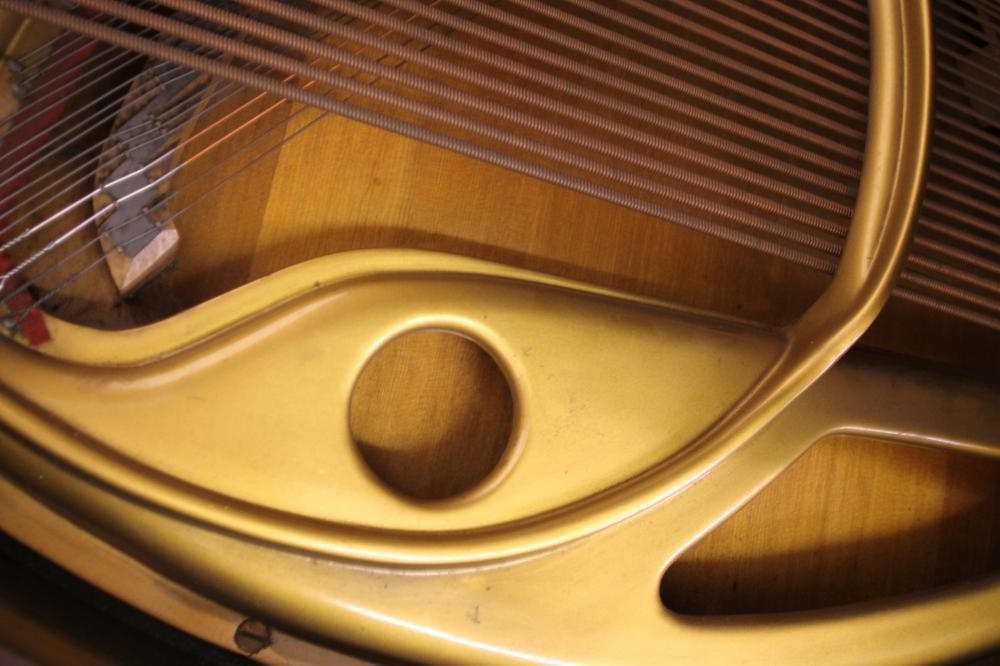 A MAHOGANY FRAMED BABY GRAND PIANO by Strohmenger Image