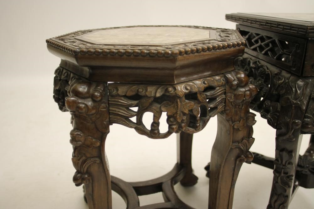 A CHINESE CARVED WOOD PLANT STAND Image