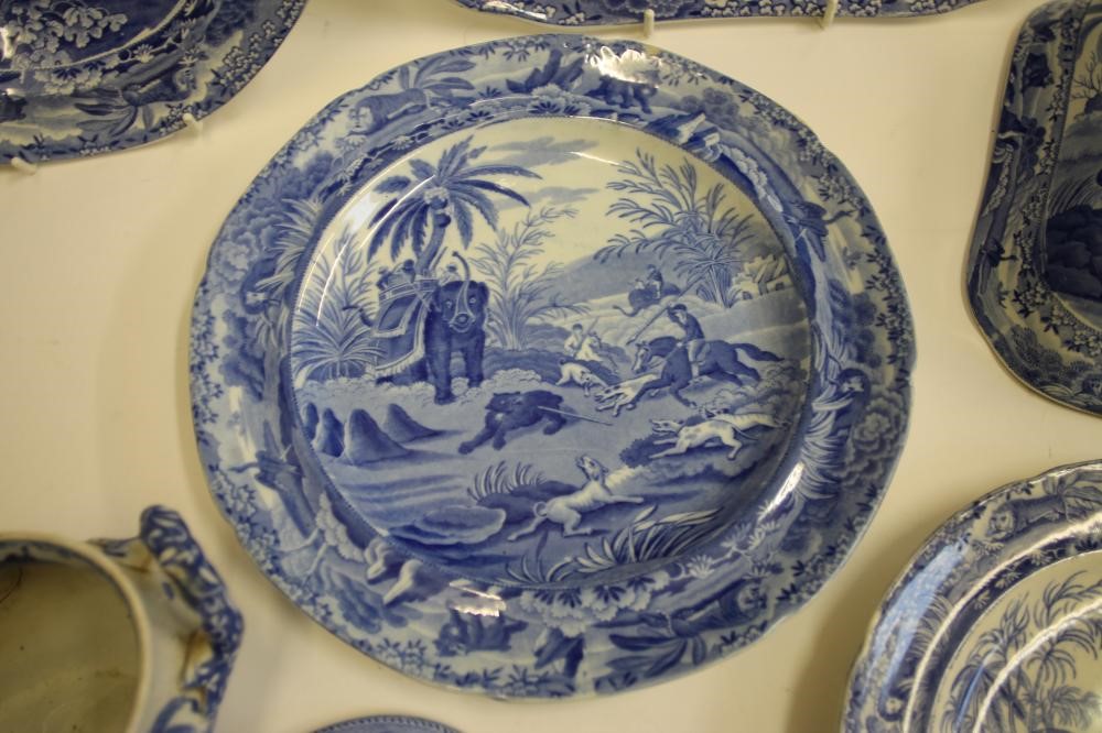 INDIAN SPORTING SERIES BLUE AND WHITE PRINTED EARTHENWARE- A Spode "Chase after a Wolf" soup plate Image