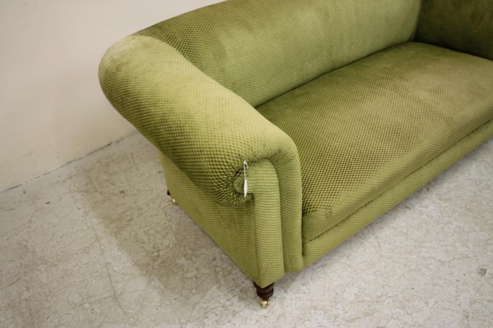 A VICTORIAN WALNUT FRAMED CHESTERFIELD SOFA upholstered in pale green cut chenille Image