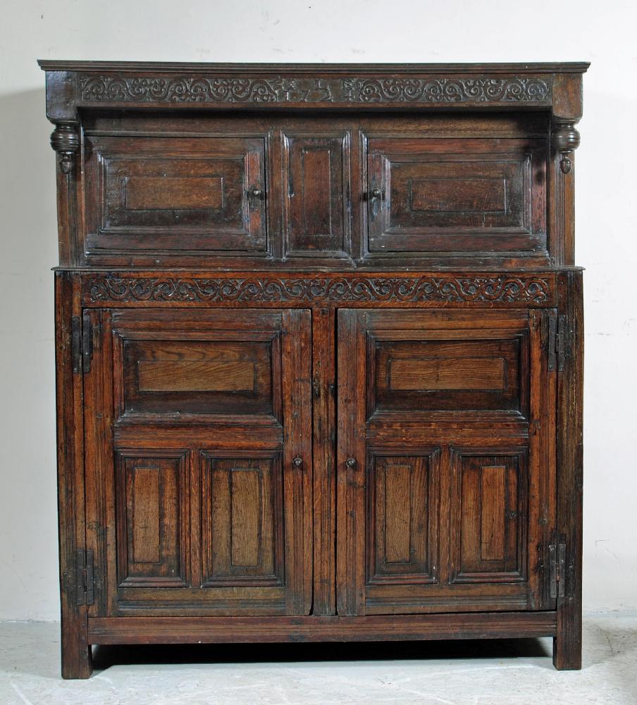 AN OAK PRESS CUPBOARD Image