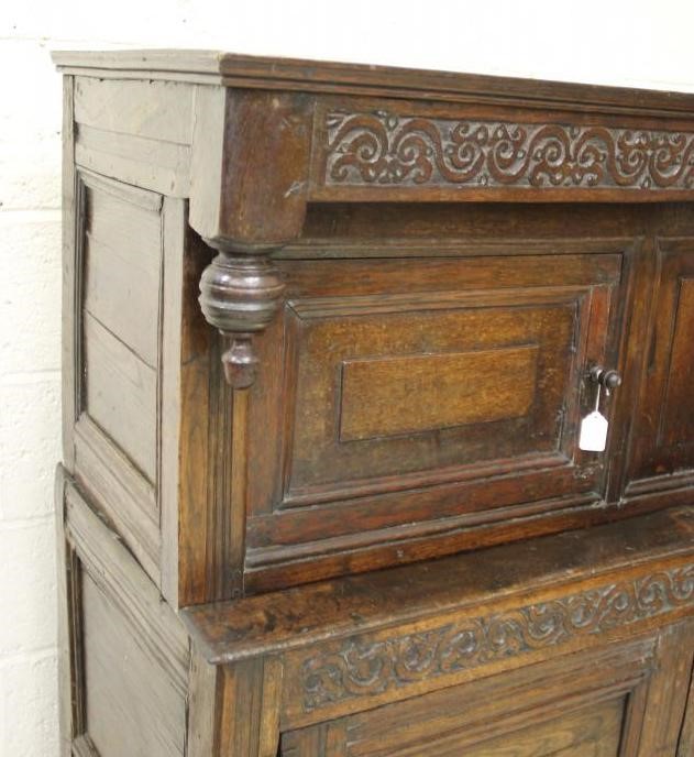 AN OAK PRESS CUPBOARD Image
