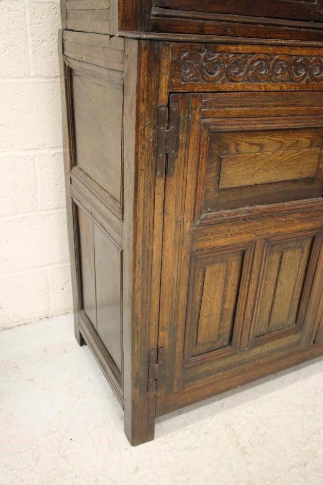 AN OAK PRESS CUPBOARD Image
