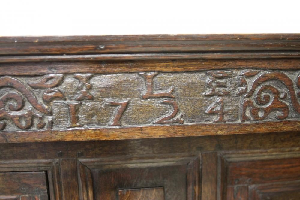 AN OAK PRESS CUPBOARD Image
