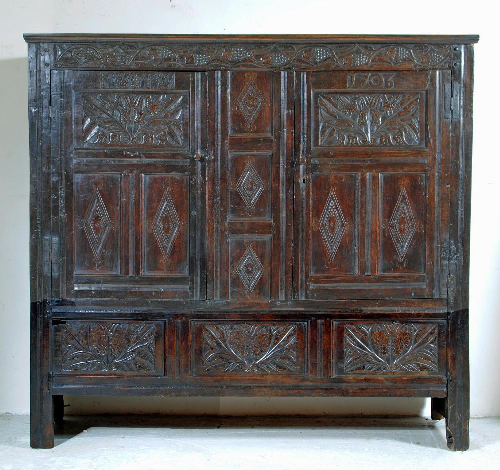AN OAK LIVERY CUPBOARD Image