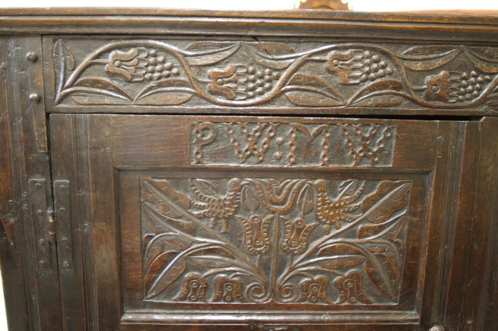 AN OAK LIVERY CUPBOARD Image