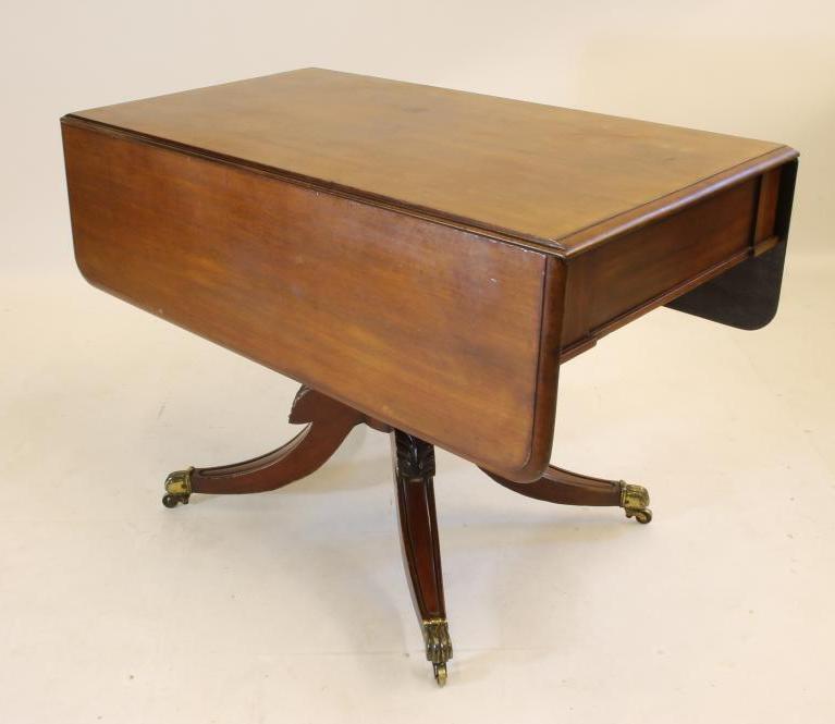 A VICTORIAN MAHOGANY PEMBROKE TABLE of rounded oblong form Image