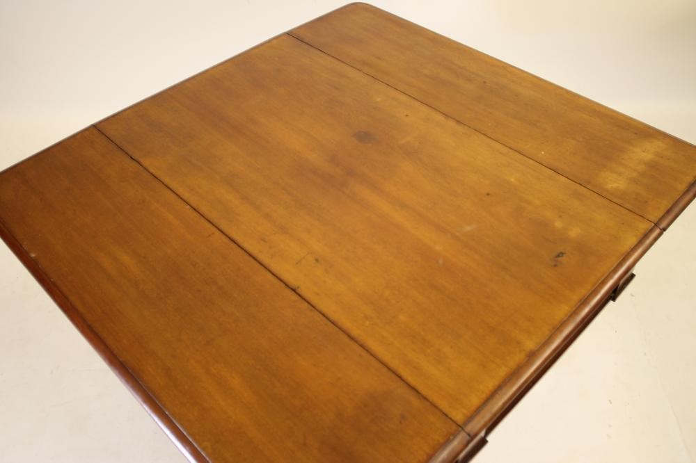 A VICTORIAN MAHOGANY PEMBROKE TABLE of rounded oblong form Image