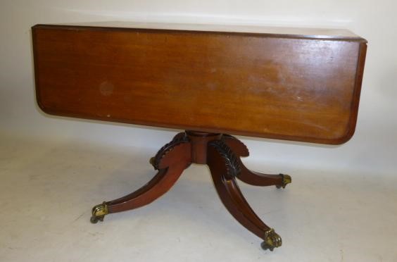 A VICTORIAN MAHOGANY PEMBROKE TABLE of rounded oblong form Image