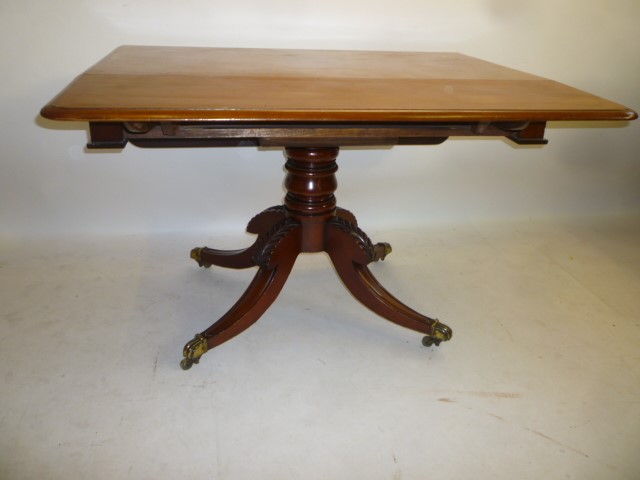 A VICTORIAN MAHOGANY PEMBROKE TABLE of rounded oblong form Image