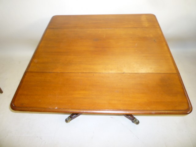 A VICTORIAN MAHOGANY PEMBROKE TABLE of rounded oblong form Image