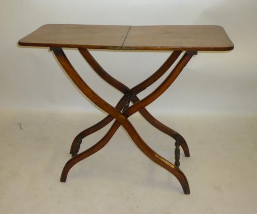A MAHOGANY COACHING TABLE Image