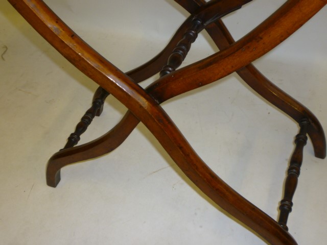 A MAHOGANY COACHING TABLE Image
