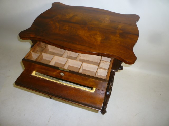 A VICTORIAN ROSEWOOD WORK TABLE Image