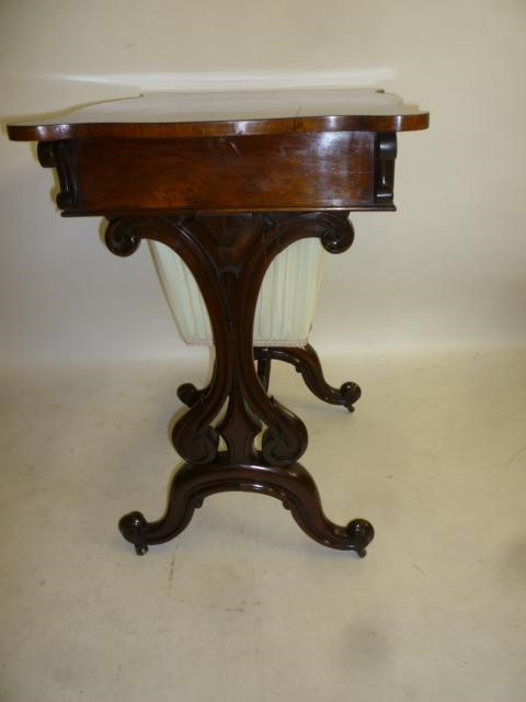 A VICTORIAN ROSEWOOD WORK TABLE Image