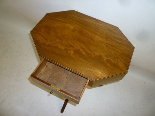 A MAHOGANY TRIPOD STEM TABLE  of canted oblong form with stringing Image