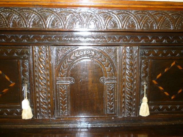 AN OAK PRESS CUPBOARD Image