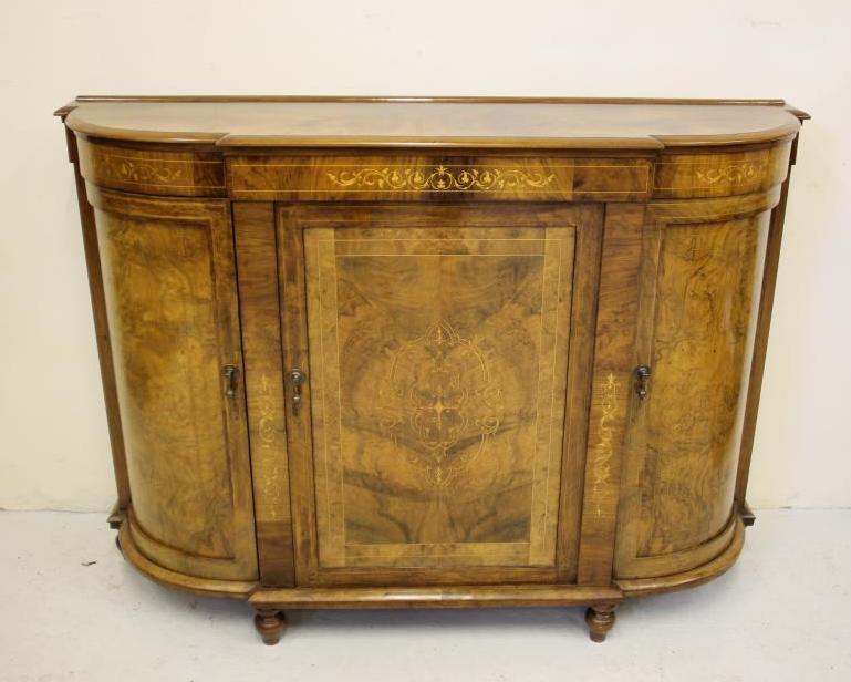 A VICTORIAN WALNUT CREDENZA of breakfront D form with stringing and marquetry foliate sprays Image