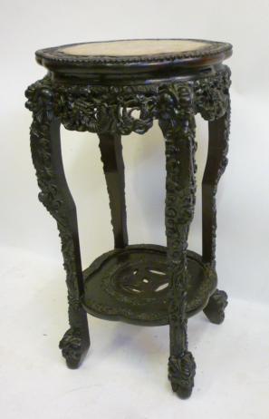 AN ORIENTAL PADOUK WOOD JARDINIERE STAND Image