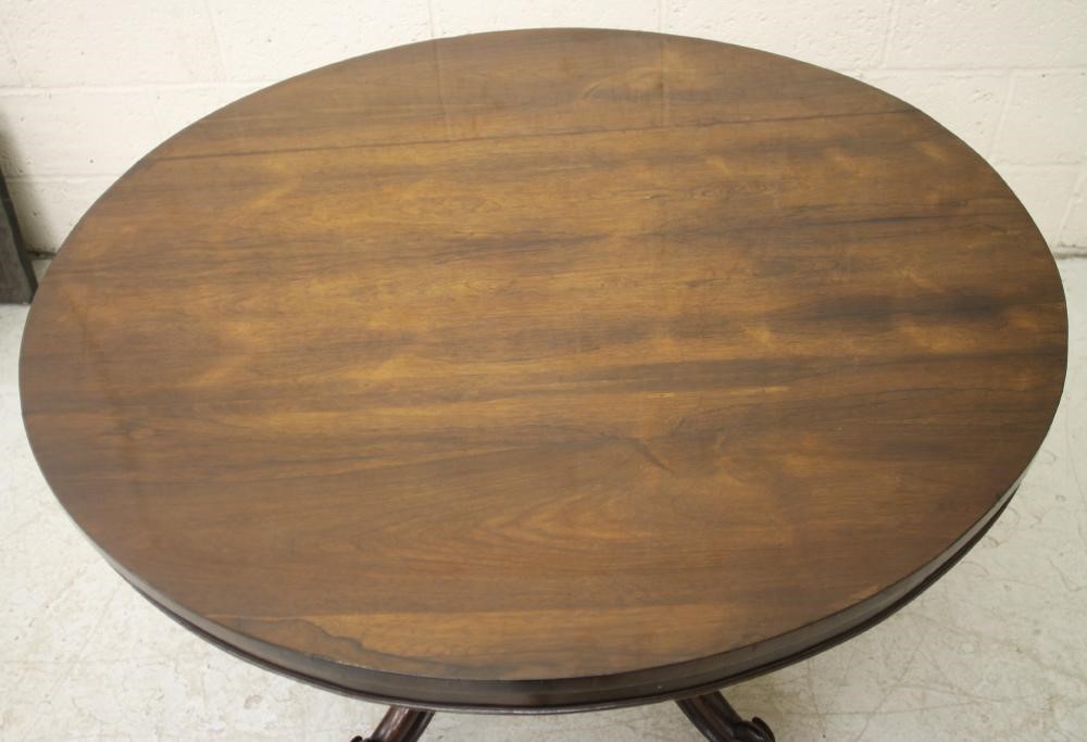 A VICTORIAN ROSEWOOD BREAKFAST TABLE Image