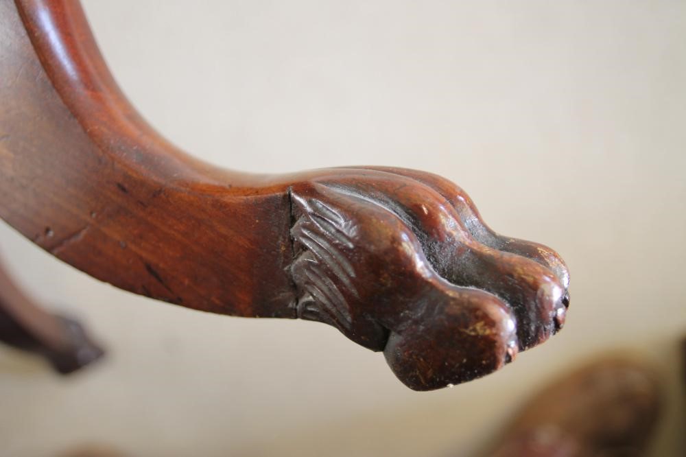 AN EARLY VICTORIAN MAHOGANY TRIPOD TABLE of rounded oblong form with three quarter gallery Image