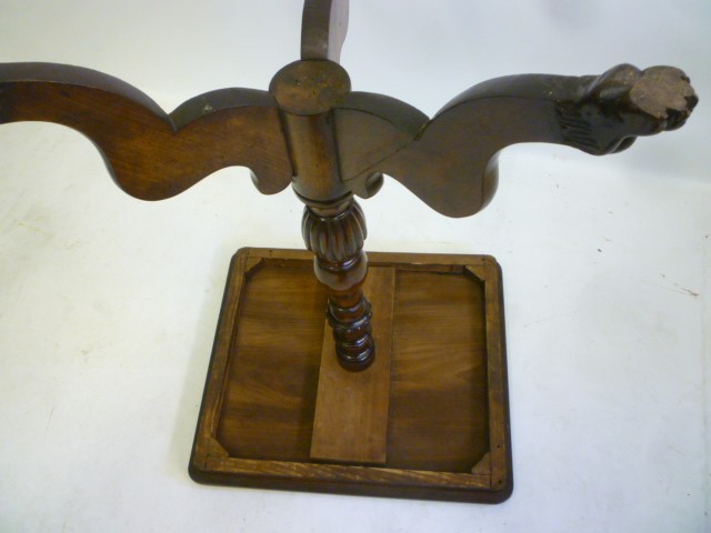 AN EARLY VICTORIAN MAHOGANY TRIPOD TABLE of rounded oblong form with three quarter gallery Image