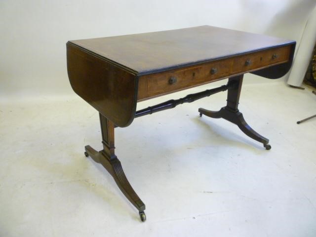 A MAHOGANY SOFA TABLE Image