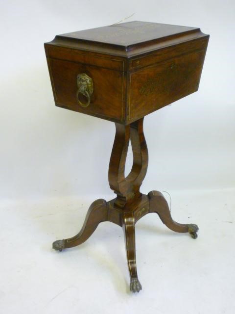 A REGENCY ROSEWOOD AND BRASS INLAID TEAPOY of sarcophagus form Image